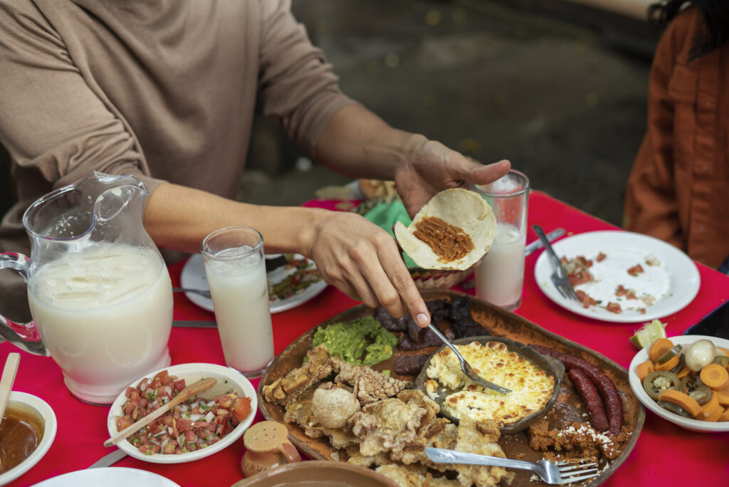 adults enjoying mexican food