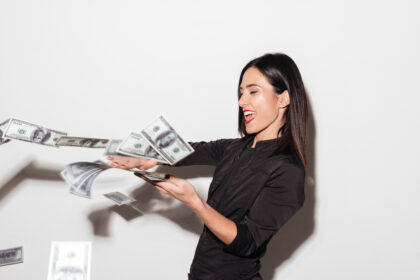 woman with red lips scatters money