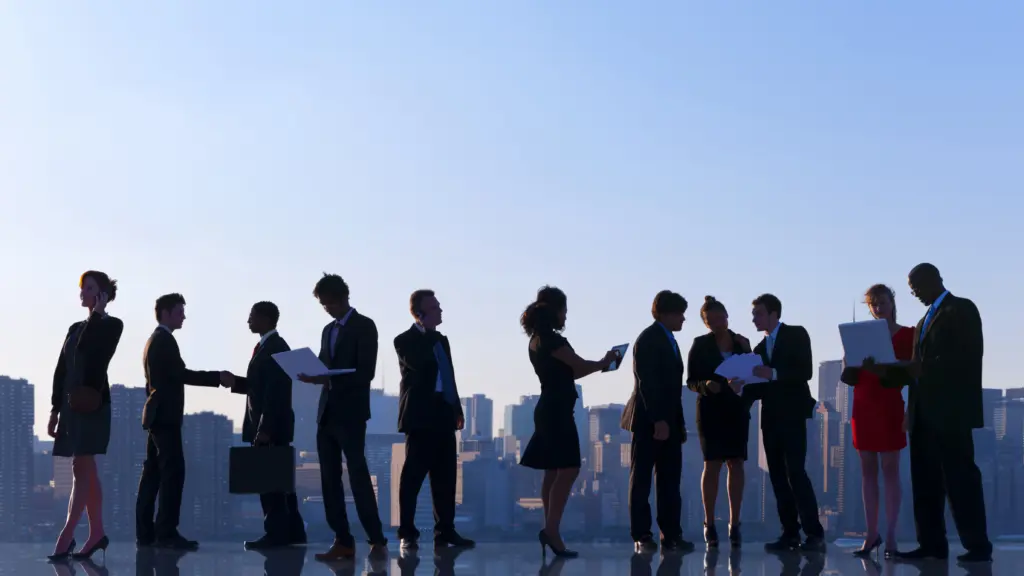 business colleagues rooftop talking