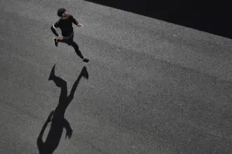 man sportswear running road