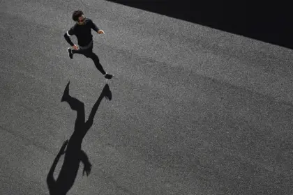 man sportswear running road
